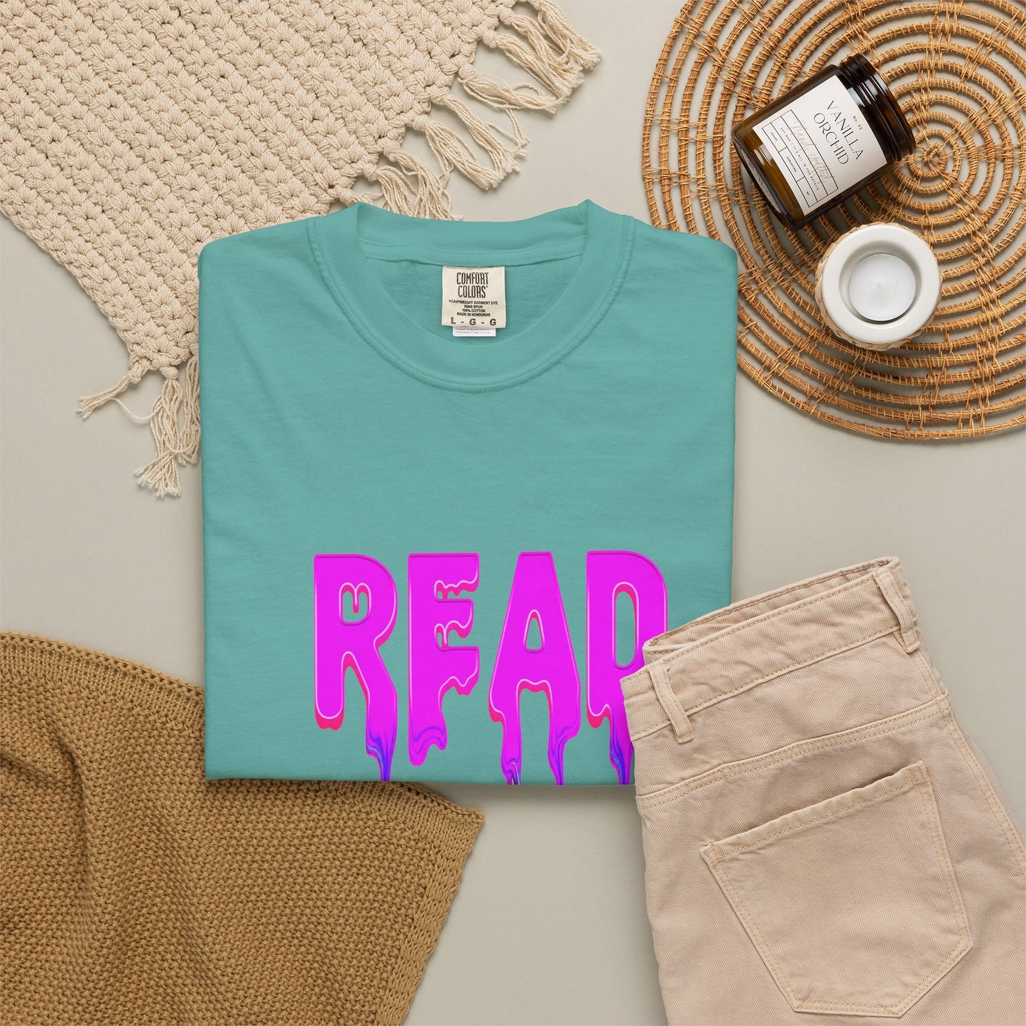 "READ" Dripping Graphic T-Shirt — Psychedelic Melting Book Design