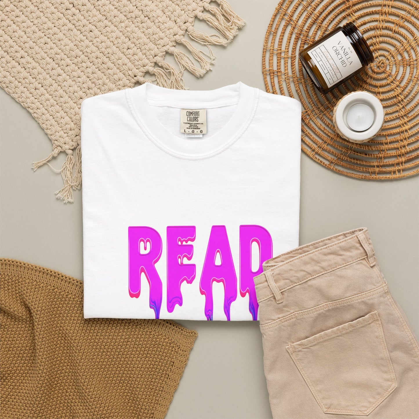 "READ" Dripping Graphic T-Shirt — Psychedelic Melting Book Design