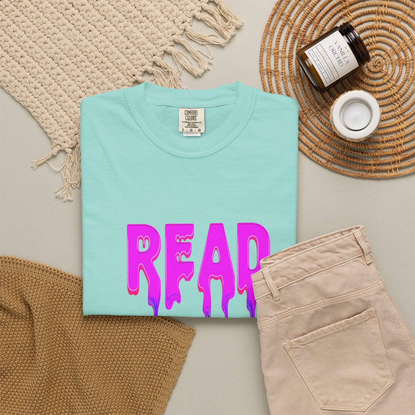 "READ" Dripping Graphic T-Shirt — Psychedelic Melting Book Design