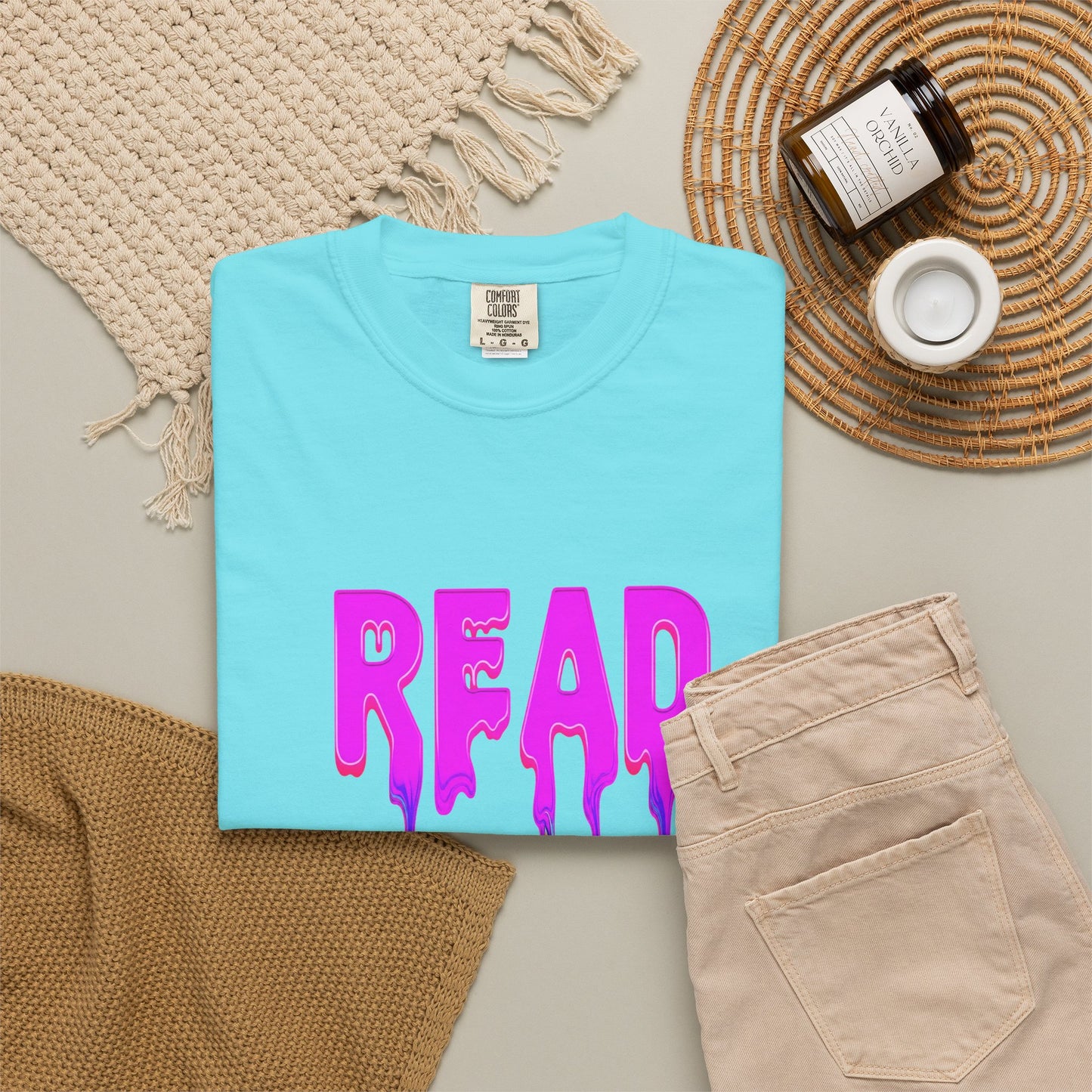 "READ" Dripping Graphic T-Shirt — Psychedelic Melting Book Design