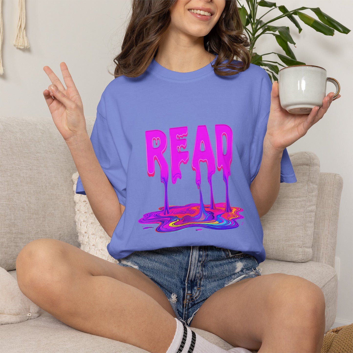 "READ" Dripping Graphic T-Shirt — Psychedelic Melting Book Design
