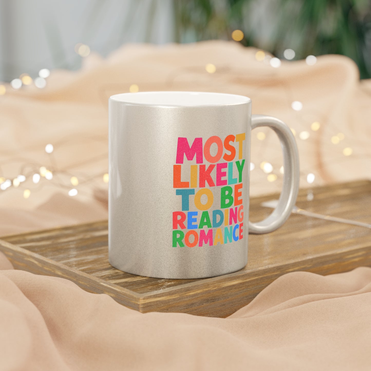 Metallic Mug — "Most Likely to Be Reading Romance" Silver Coffee Cup for Romance Lovers