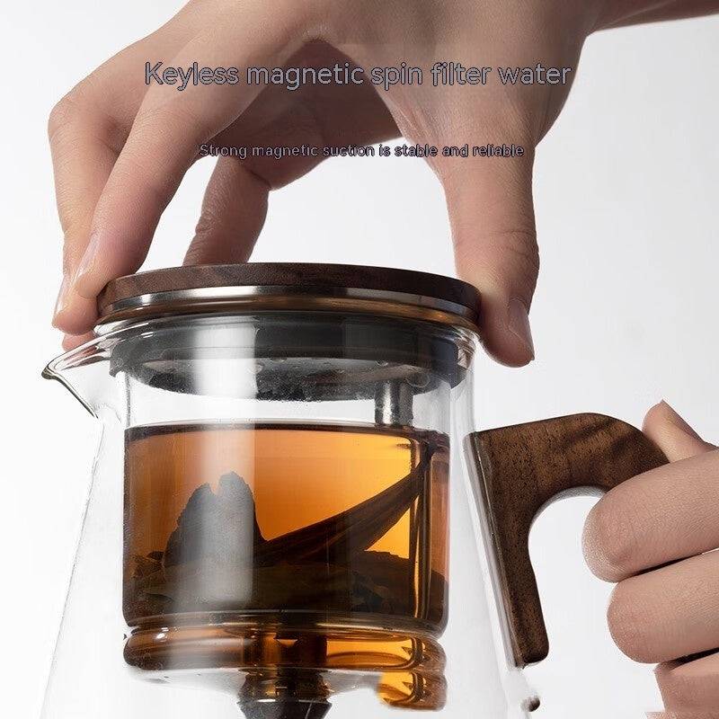 Théière en verre avec filtre à pression pour infusions élégantes