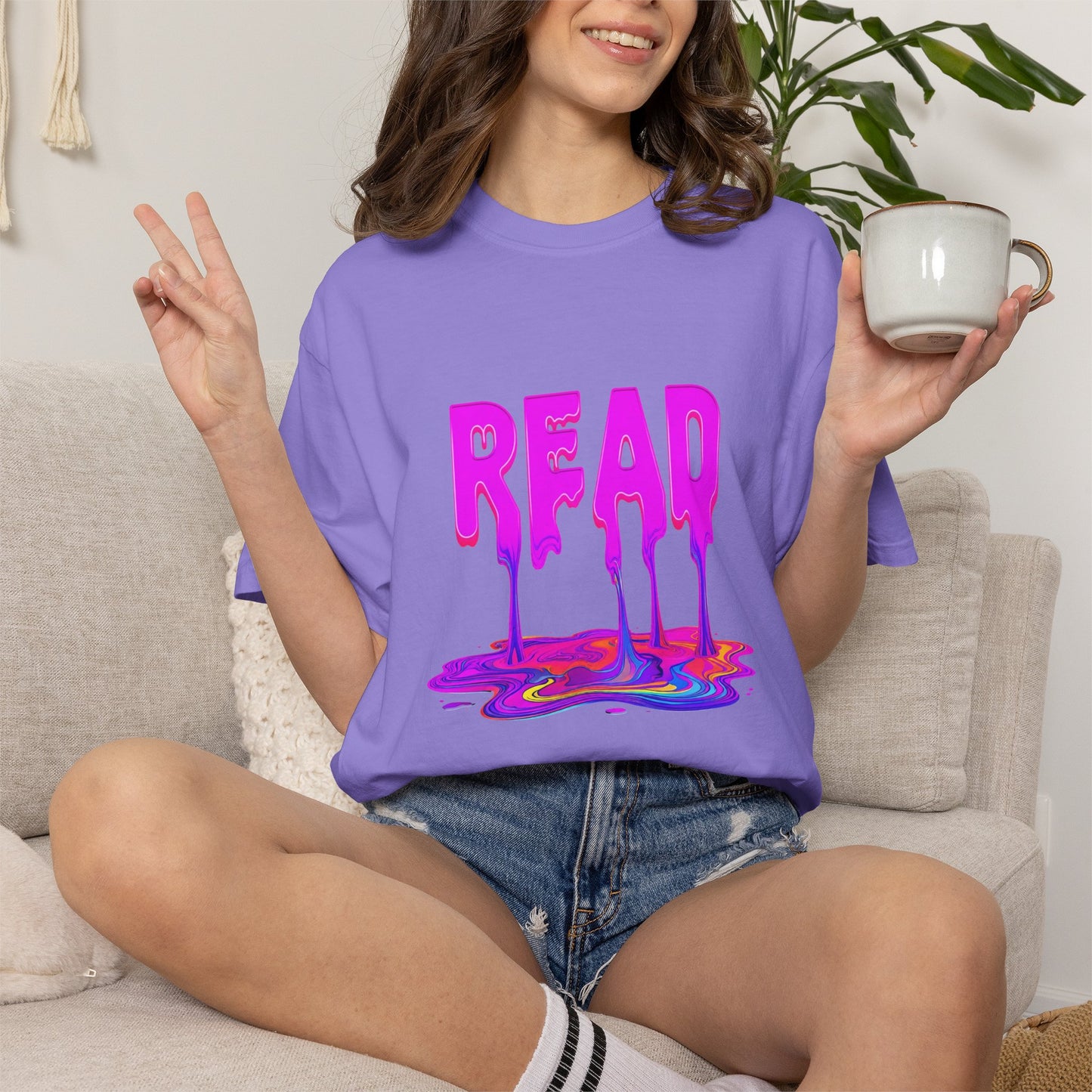 "READ" Dripping Graphic T-Shirt — Psychedelic Melting Book Design