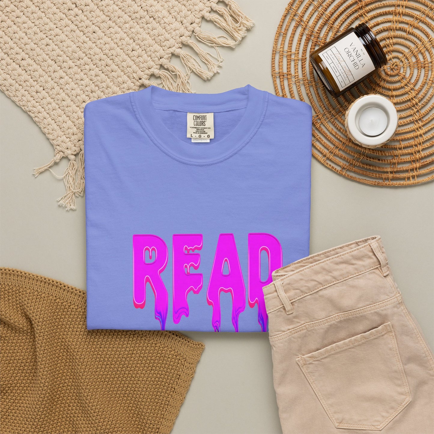 "READ" Dripping Graphic T-Shirt — Psychedelic Melting Book Design