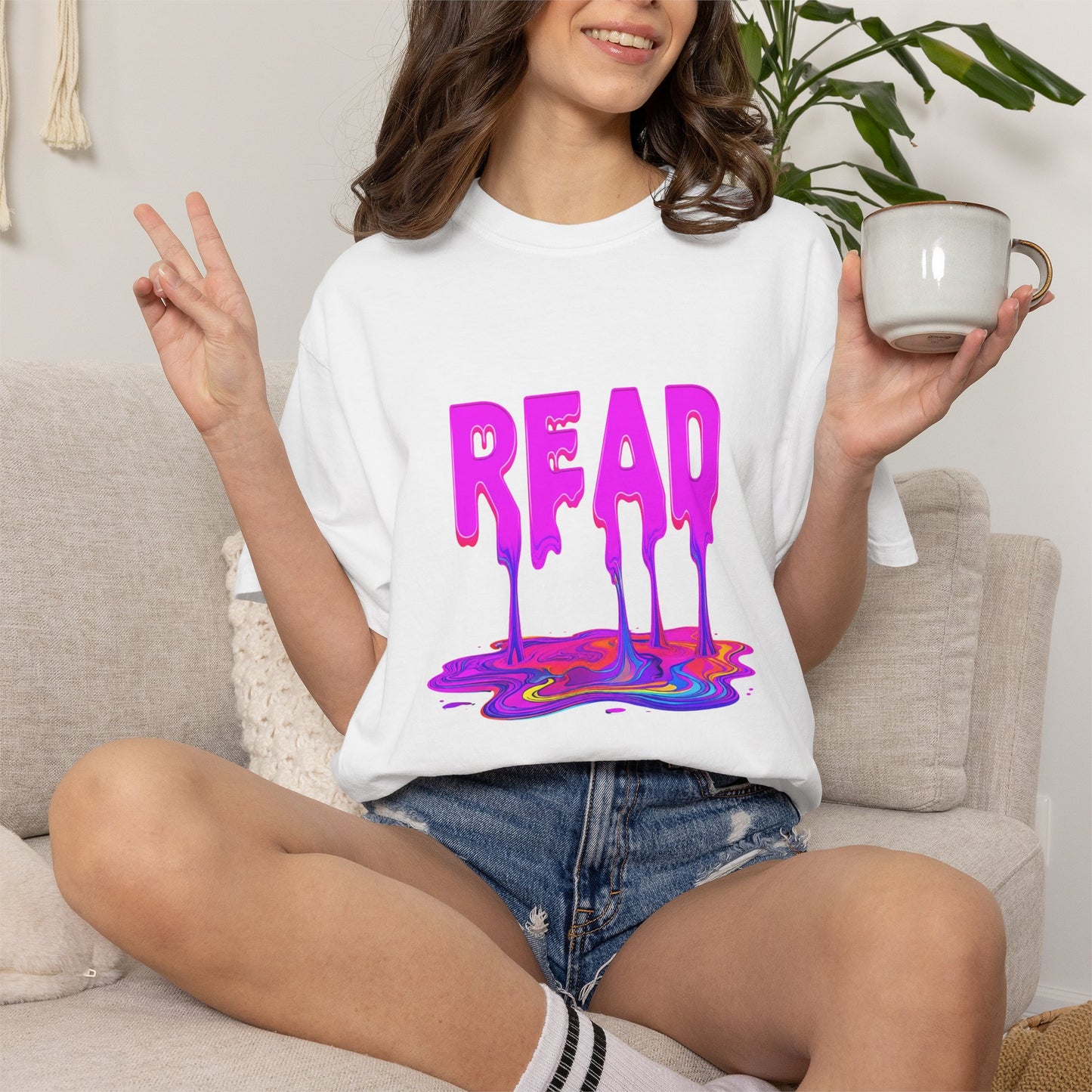 "READ" Dripping Graphic T-Shirt — Psychedelic Melting Book Design