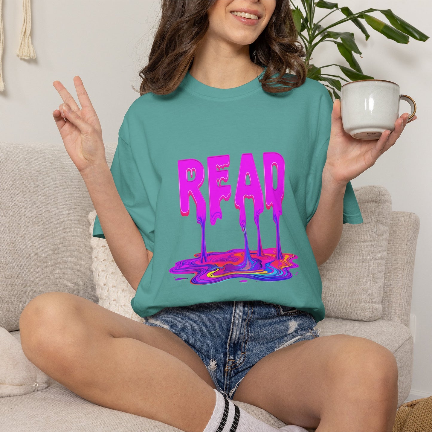 "READ" Dripping Graphic T-Shirt — Psychedelic Melting Book Design