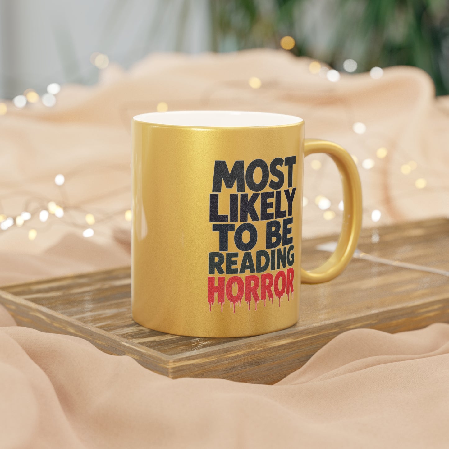 Metallic Mug — “Most Likely to Be Reading Horror” Gold Coffee Cup for Horror Fans