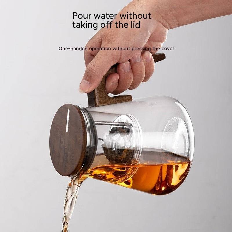 Théière en verre avec filtre à pression pour infusions élégantes