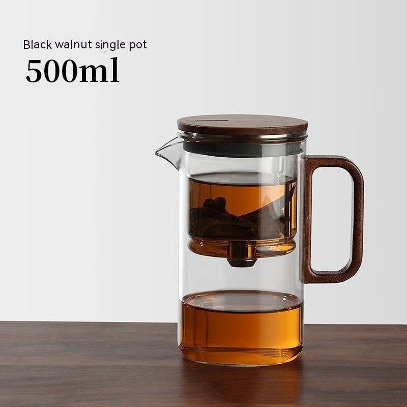 Théière en verre avec filtre à pression pour infusions élégantes